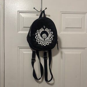 Black and White Backpack with Checkered Design